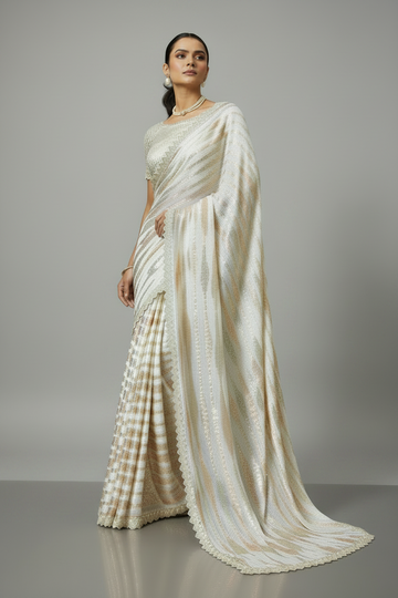 Dazzling ivory saree with shimmering gold stripes