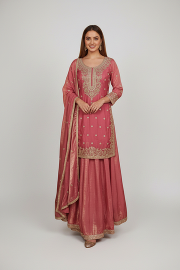Beautifully embroidered pink sharara suit with elegant zari detailing