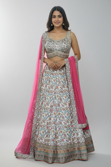 Elegant floral lehenga set with intricate embroidery, and vibrant pink dupatta
