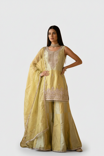 Mesmerising  yellow sharara suit with intricate zari work