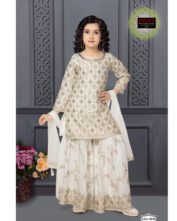 Stunning white sharara with net dupatta