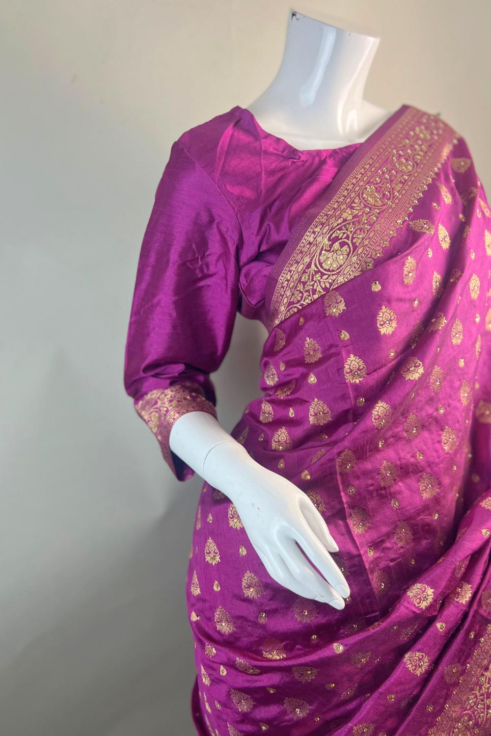 Elegant pink saree with Gold Print