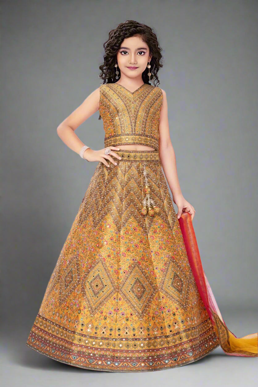 This stunning mustard yellow lehenga is adorned with intricate mirror work and colorful floral embroidery Main image