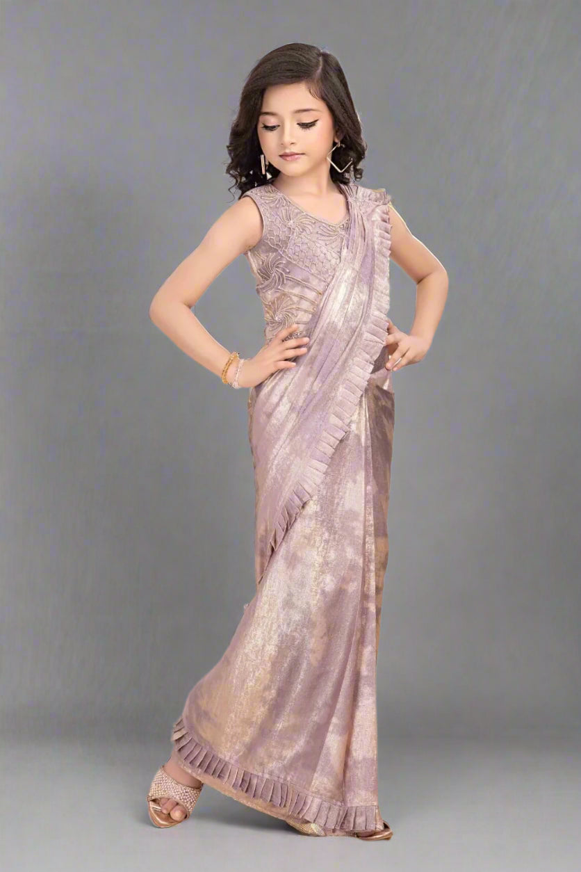 lavender pre-stitched saree gown with pleated border and embroidered blouse.