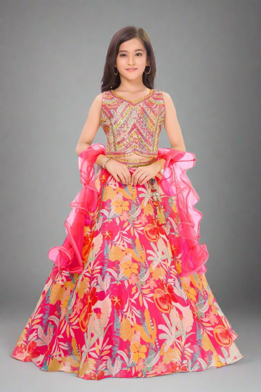 Vibrant floral lehenga with golden blouse and ruffled pink dupatta