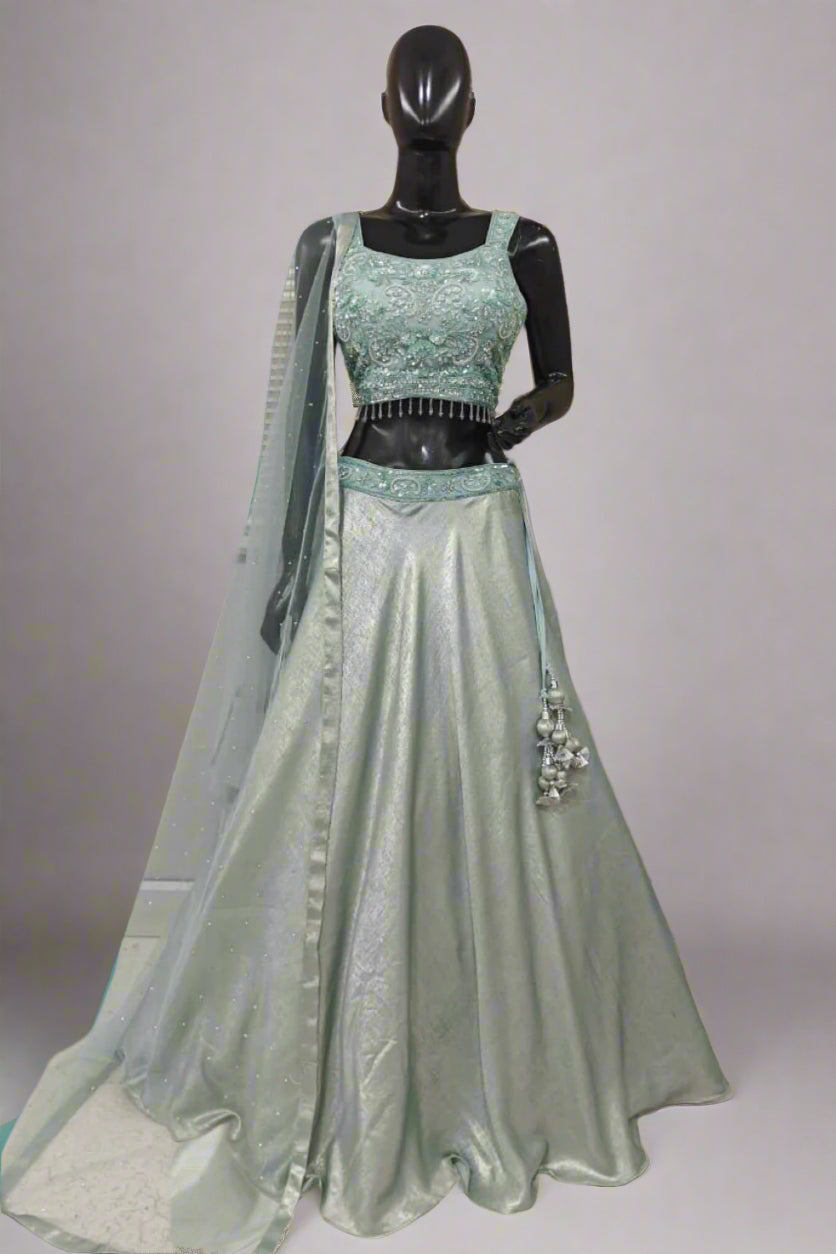 Elegant blush pink lehenga with intricate embroidery