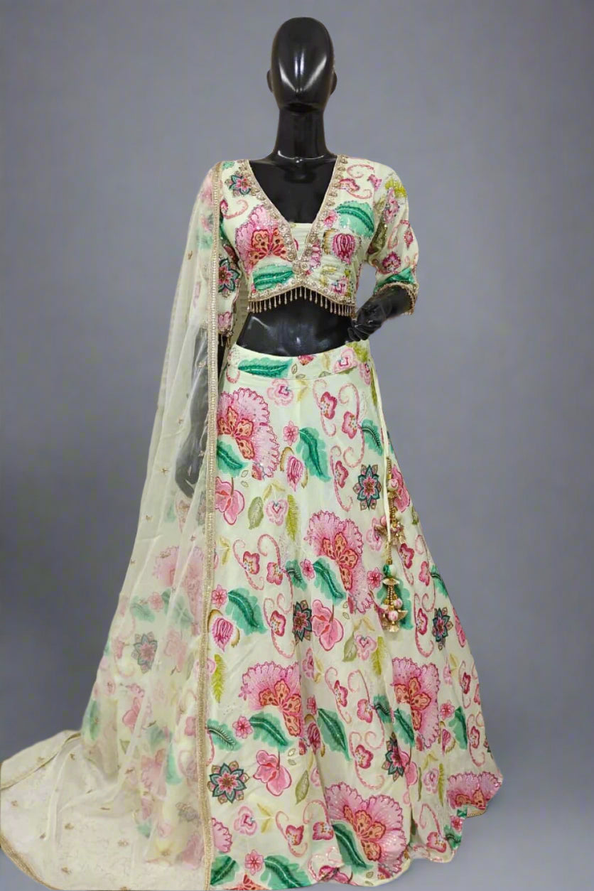 Vibrant pink lehenga with bold floral embroidery and a matching dupatta