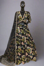 Vibrant pink lehenga with bold floral embroidery and a matching dupatta