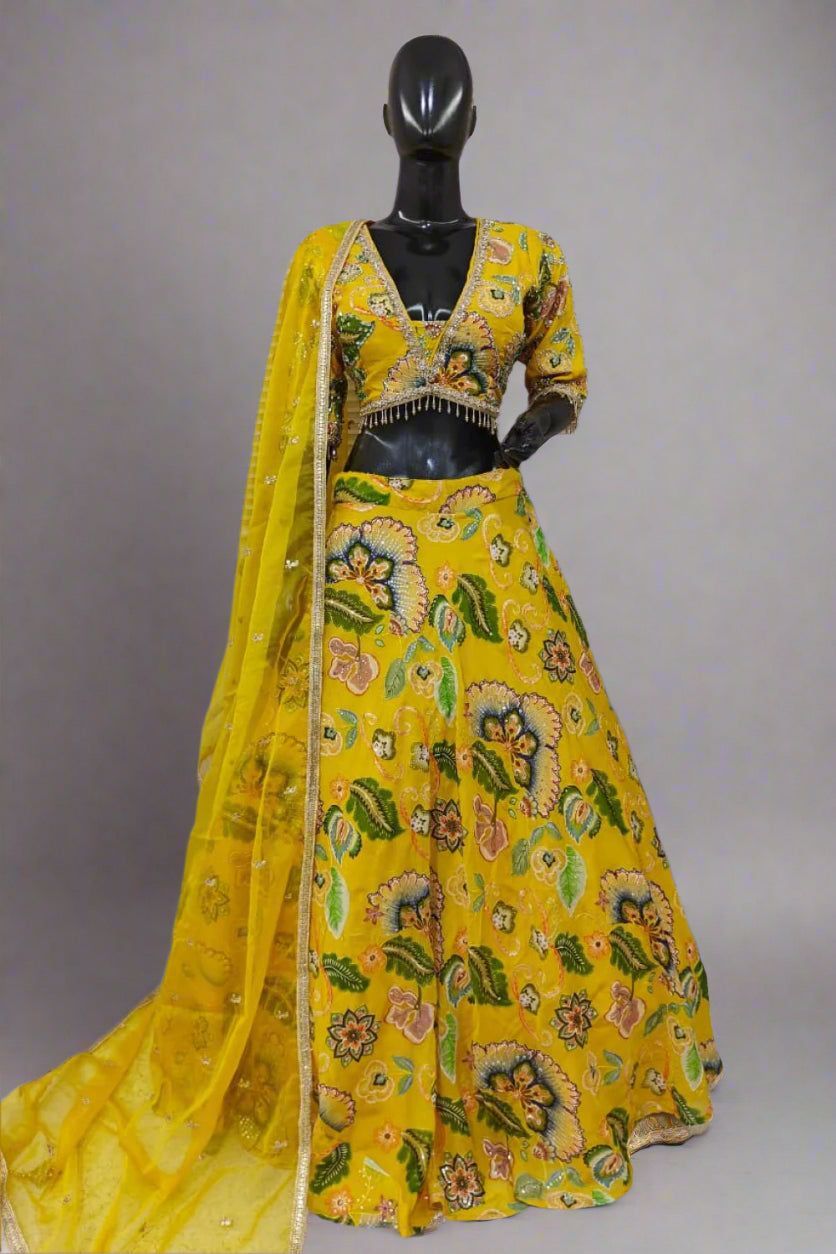 Vibrant pink lehenga with bold floral embroidery and a matching dupatta Secondary image