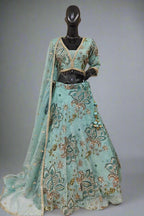 Lavender lehenga adorned with gold floral embroidery