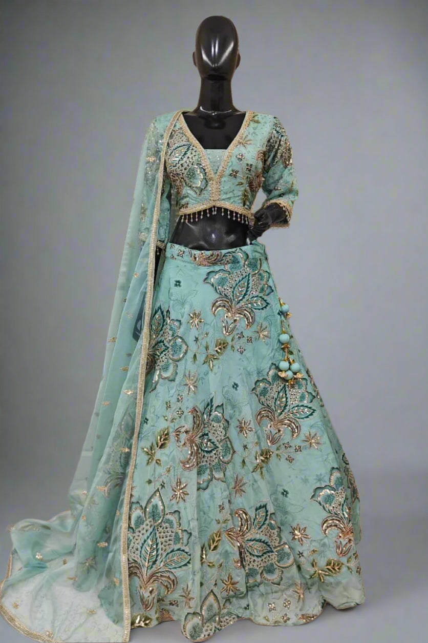 Lavender lehenga adorned with gold floral embroidery