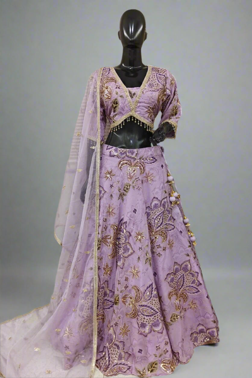 Lavender lehenga adorned with gold floral embroidery Main image