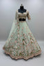 Pastel green lehenga set with intricate floral embroidery