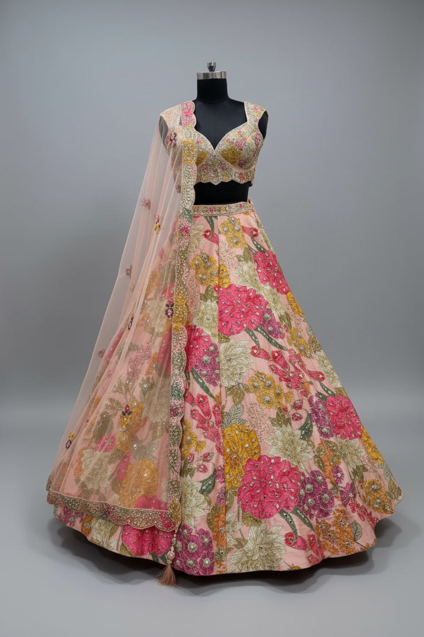 Soft peach pink lehenga with vibrant floral embroidery Main image