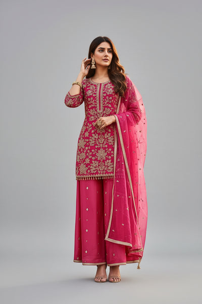 Vibrant blue ethnic suit adorned with golden embroidery