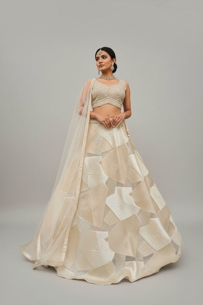 Geometric jacquard lehenga paired with an embellished blouse