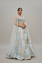 Geometric jacquard lehenga paired with an embellished blouse