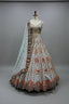 Pastel blue bridal lehenga featuring detailed threadwork