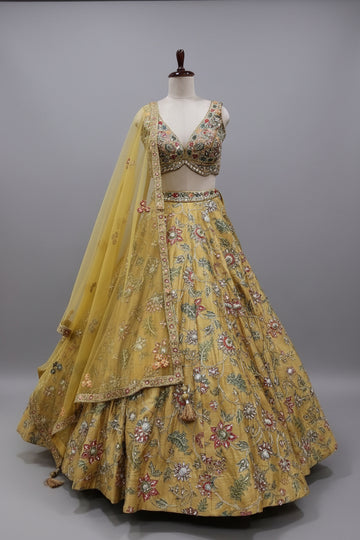 Mustard yellow embroidered lehenga with floral motifs