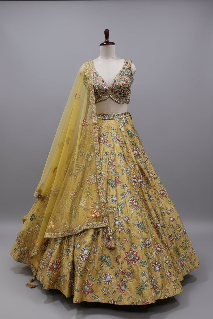 Mustard yellow embroidered lehenga with floral motifs
