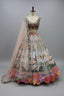 Soft pastel lehenga featuring intricate zari, threadwork, and sequin embellishments