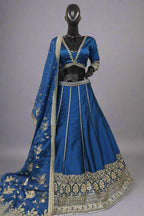 Elegant magenta silk lehenga choli with intricate golden zari and sequin embroidery work