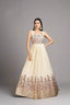 Elegant cream gown with colorful floral embroidery