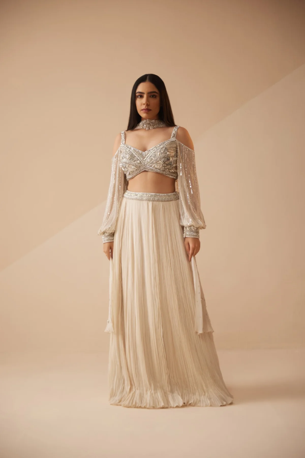 Full sleeves Ivory lehenga with sequins and cutdana work Main image