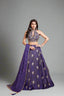 Embrace royalty in this deep purple lehenga
