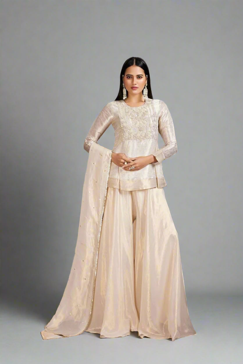 Graceful beige sharara set with intricate embroidery