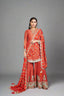 Fiery red sharara set with intricate gold detailing