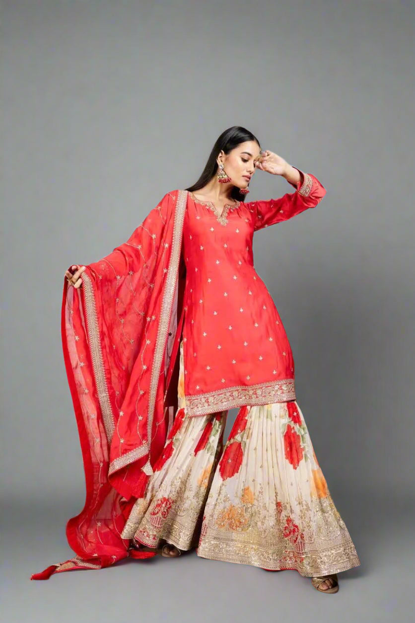 Red and cream floral sharara set with golden embroidery
