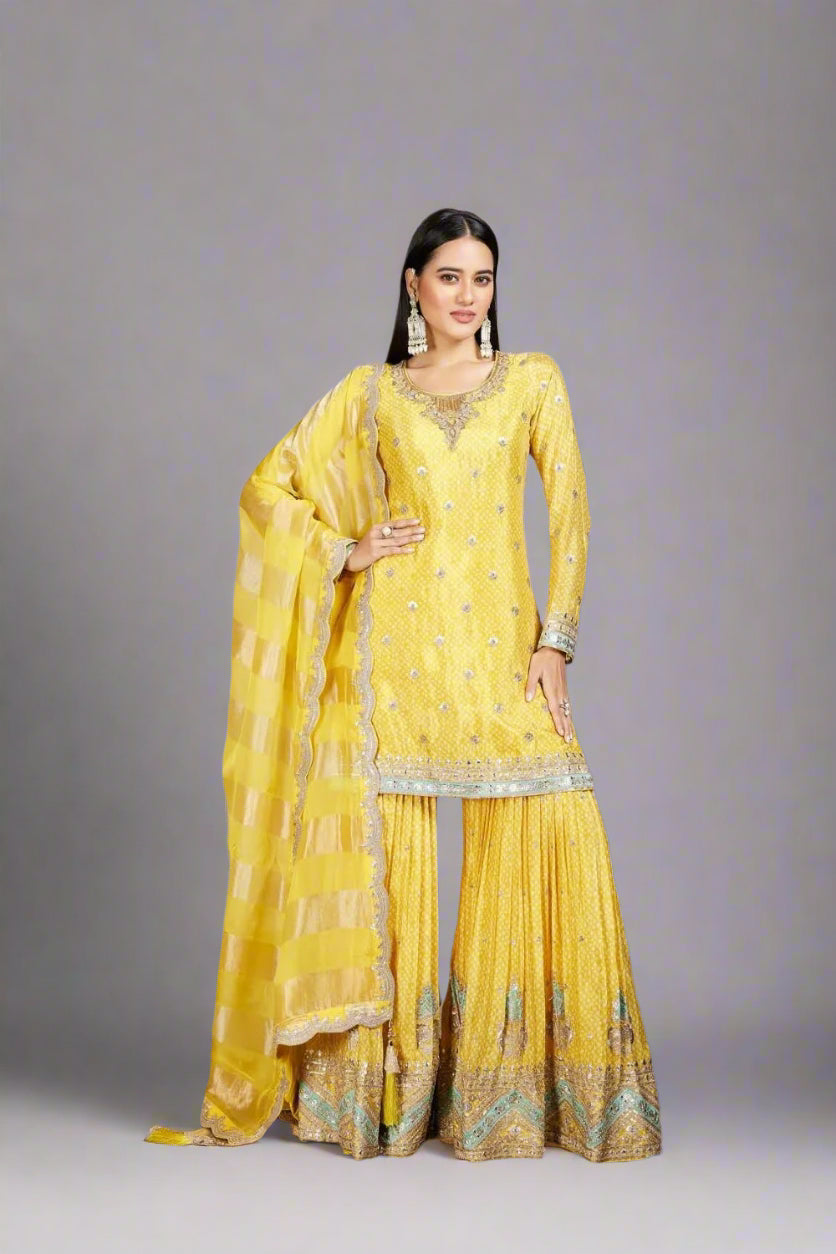 Sunshine yellow sharara suit adorned with silver embroidery
