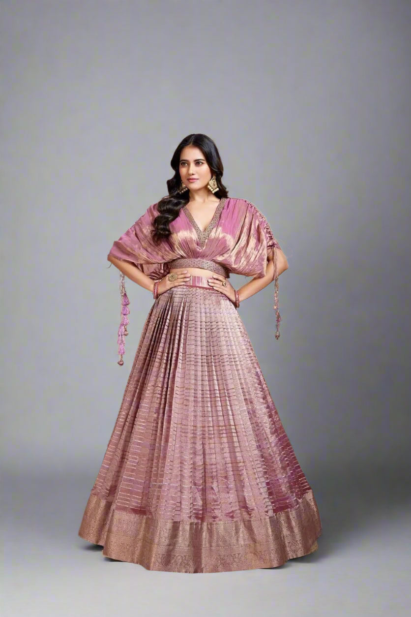 Soft mauve and blush pink lehenga features pleated elegance