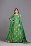 Graceful green Anarkali suit adorned with delicate floral motifs