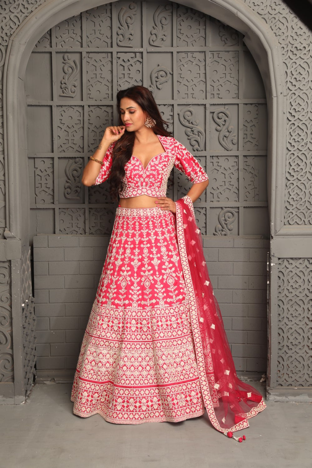Mesmerizing pink lehenga embellished with swarvoski and resham Main image