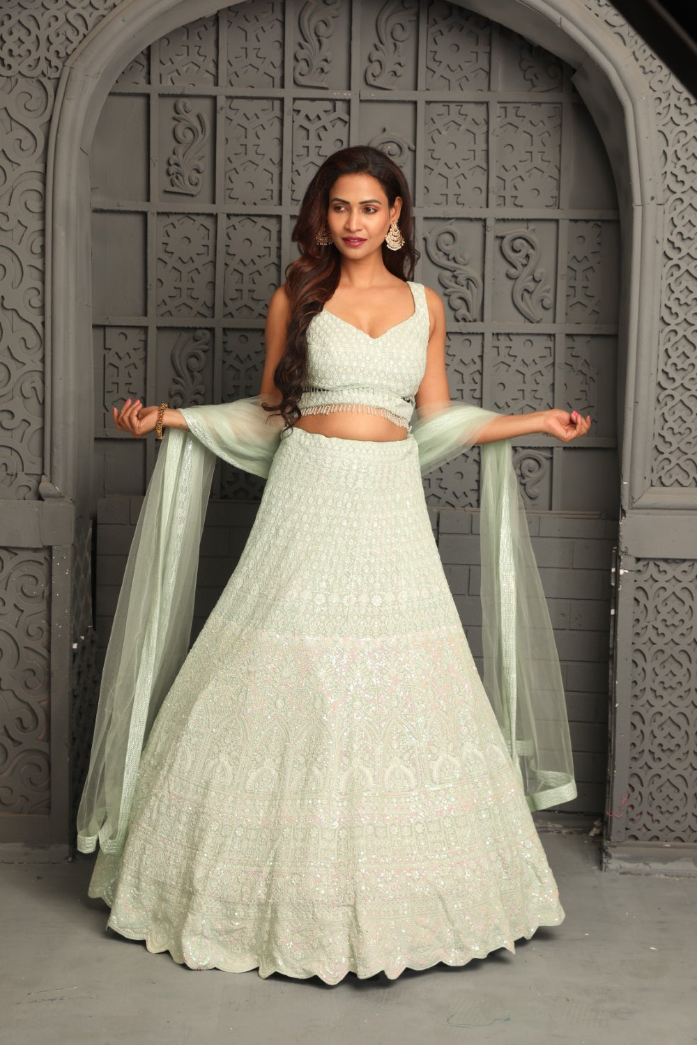 Elegant white lehenga with moti and pearl work