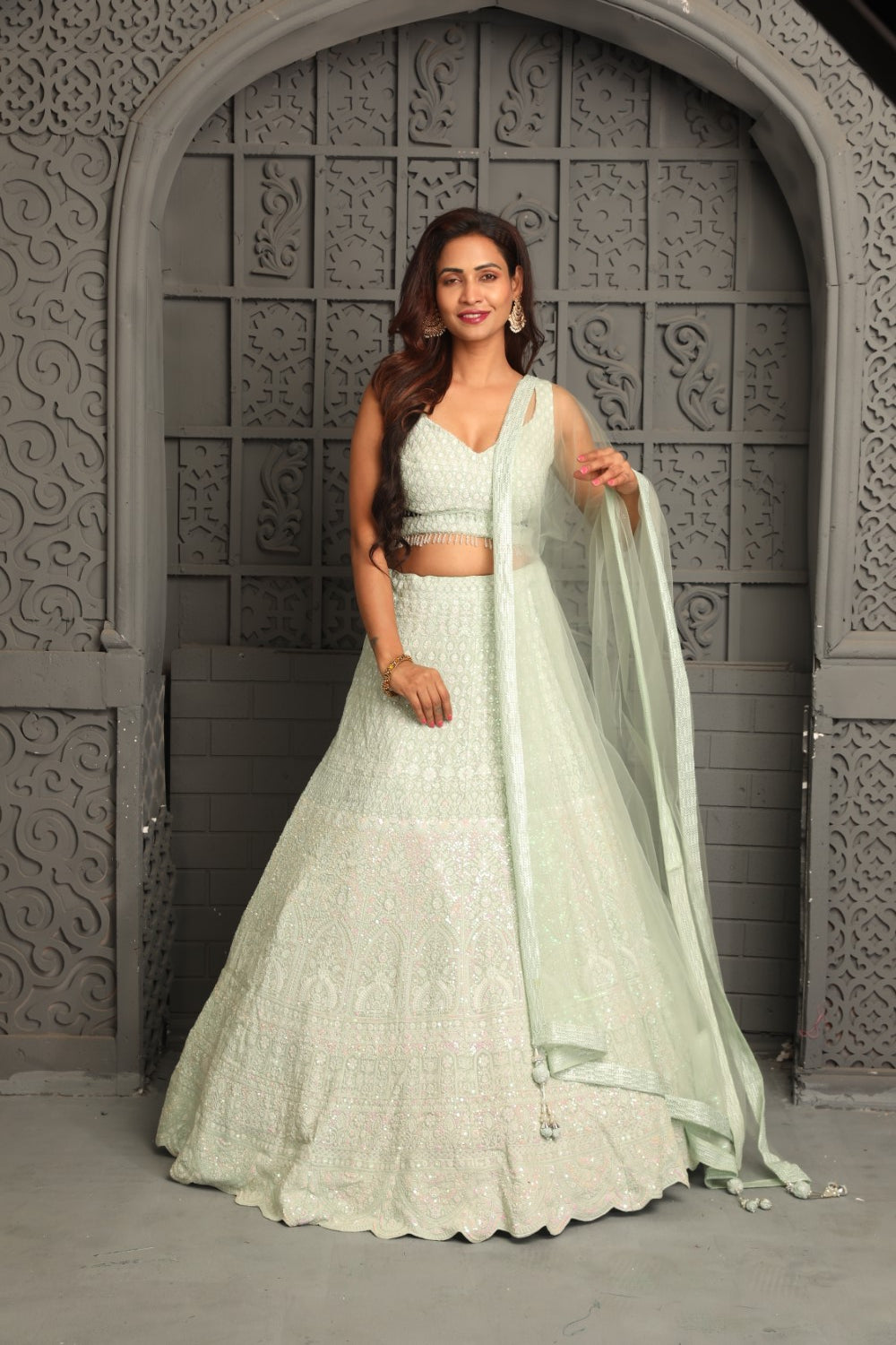 Elegant white lehenga with moti and pearl work
